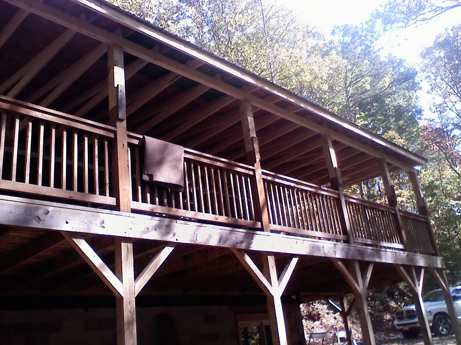 Timber framing under a new elevated porch and deck — Roof Leak Repair in Drewsey by Roofing Brothers
